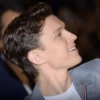 Tom Holland by 9