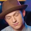 Tom Holland by 12