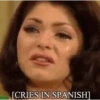 [CRIES IN SPANISH]