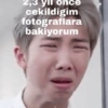 yil once cekildigim fotograflara bakiyorum