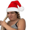 Persona con Trenzas y Gorra de Santa
