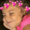 Criança Dormindo com Corações