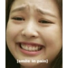 [smile in pain]